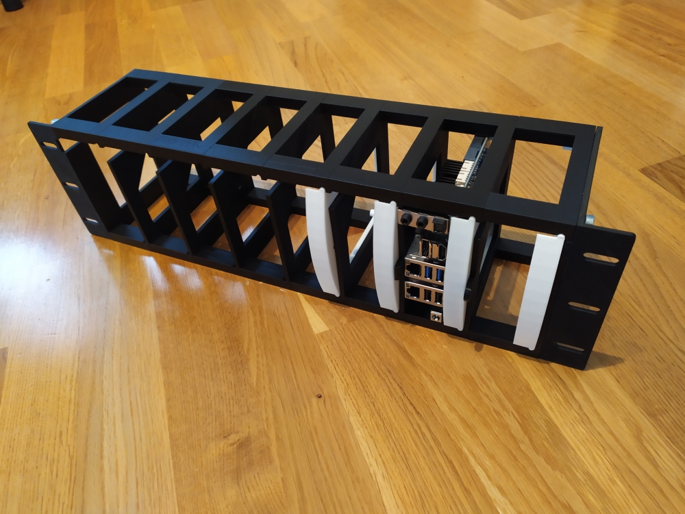 Figure 19 - The entire rack assembled, where I implemented a press fit system so that the blades don't come off the mount easily, with a click and a helper tab to get them out, similar to the Ethernet cables